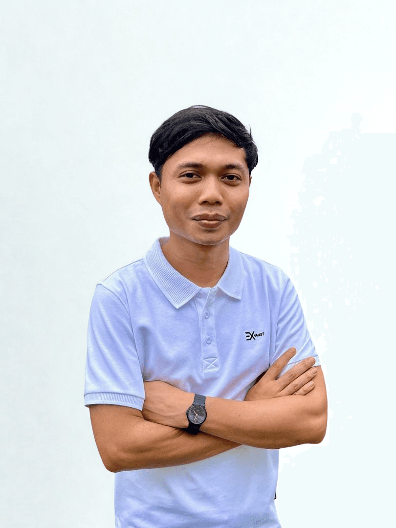 Azwar smiling in front of a dark gradient backdrop